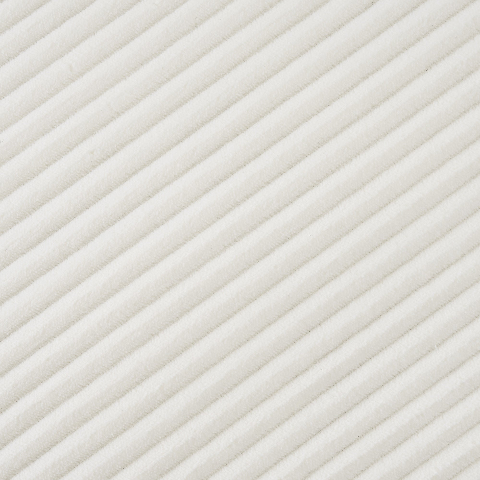 Close-up of beige corduroy fabric texture from the Modular Corduroy Sofa Beige - Stylish and Comfortable, showing soft ribbed pattern.
