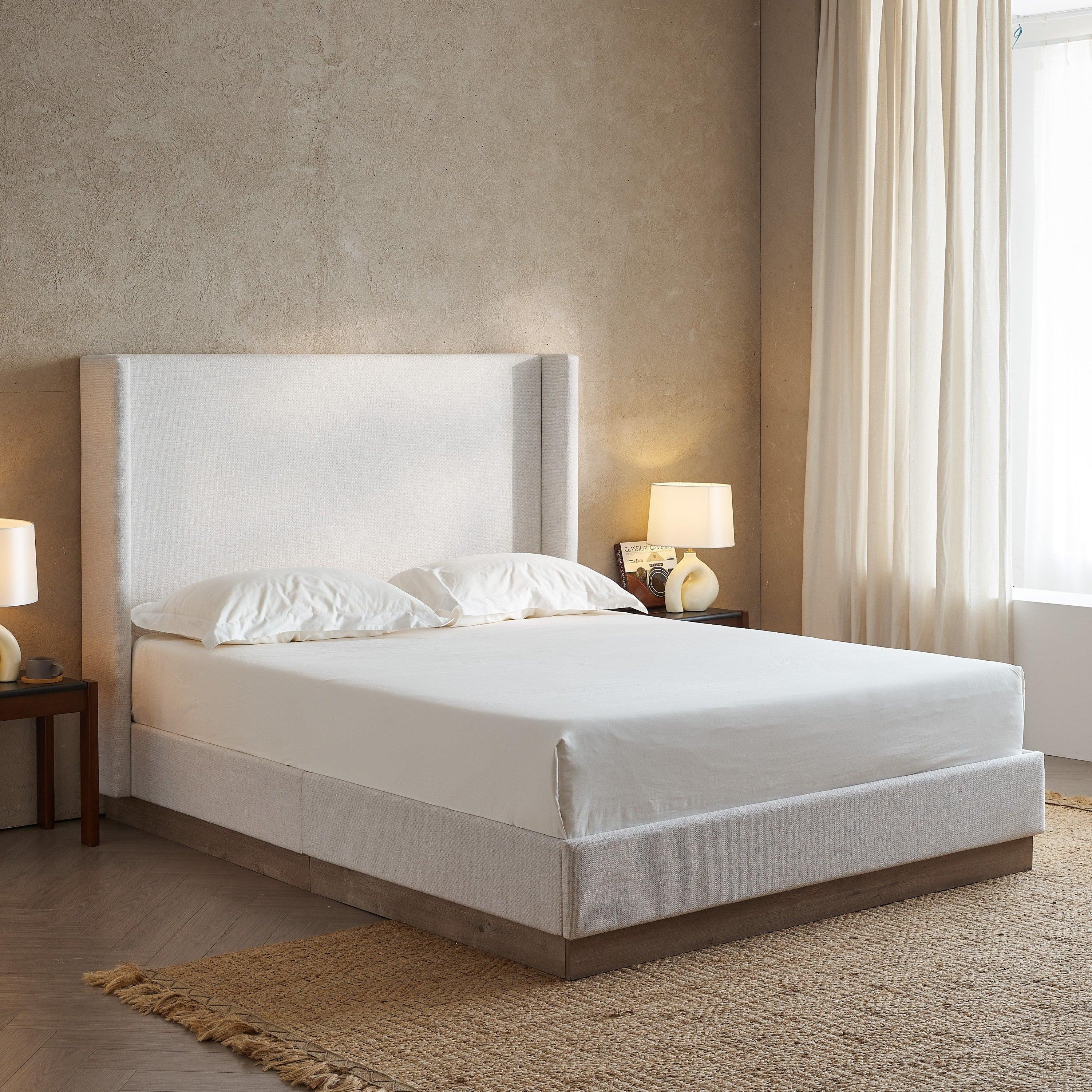 Hosford Minimalist Upholstered Wingback Bed.