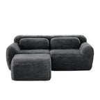 Front view of L-Shaped Sectional Sofa - Modular Plush in dark grey, showcasing its plush texture and ergonomic seating layout.