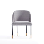 Front view of Modern Dining Chair - Stylish Grey - Durable Metal Base with plush seat and ergonomic backrest, perfect for modern interiors.