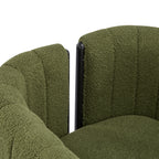 Detail of curved backrest and plush olive green boucle fabric on modern dining chair, highlighting its cozy and modern design.