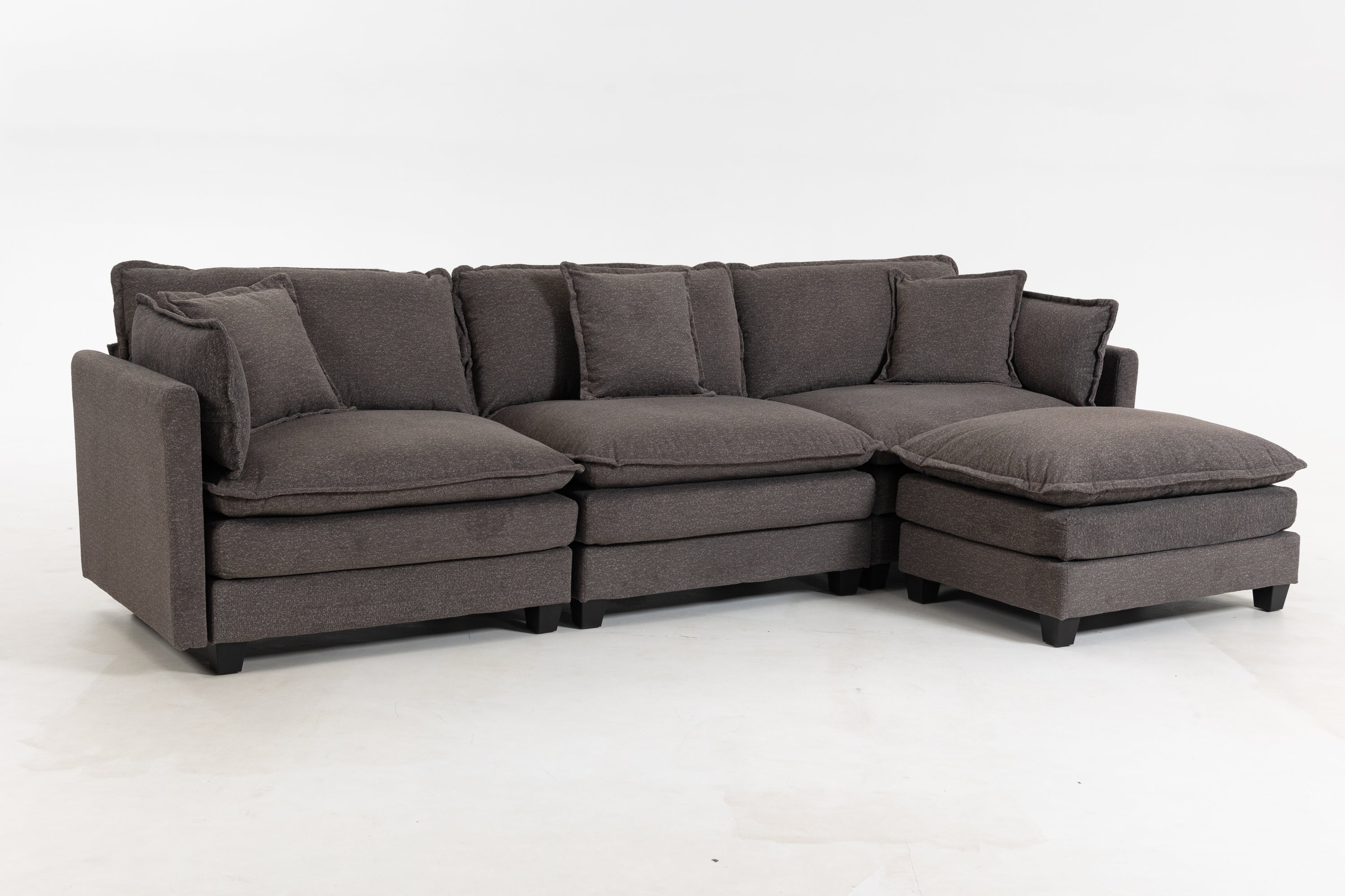 Modern Sectional Sofa with Ottoman in dark gray chenille. Sturdy wood frame and spacious seating ideal for contemporary interiors.