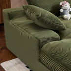 Green Corduroy Sofa with Cushions and Pillows.
