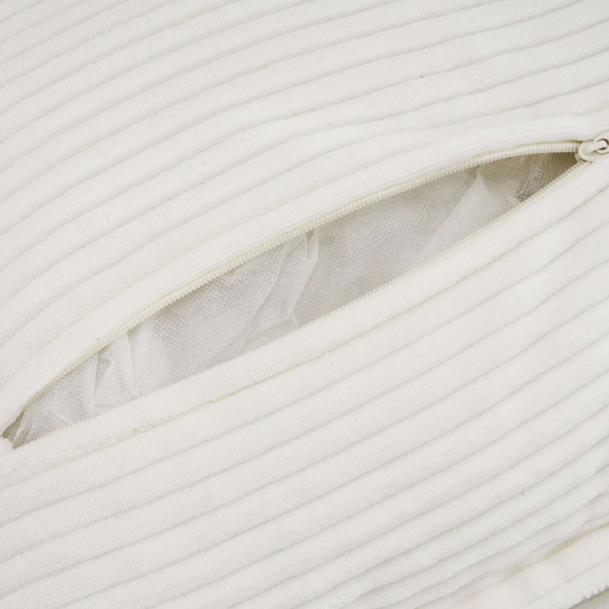 Zippered pillow cover from Modular Corduroy Sofa Beige - Stylish and Comfortable, demonstrating removable and washable design.