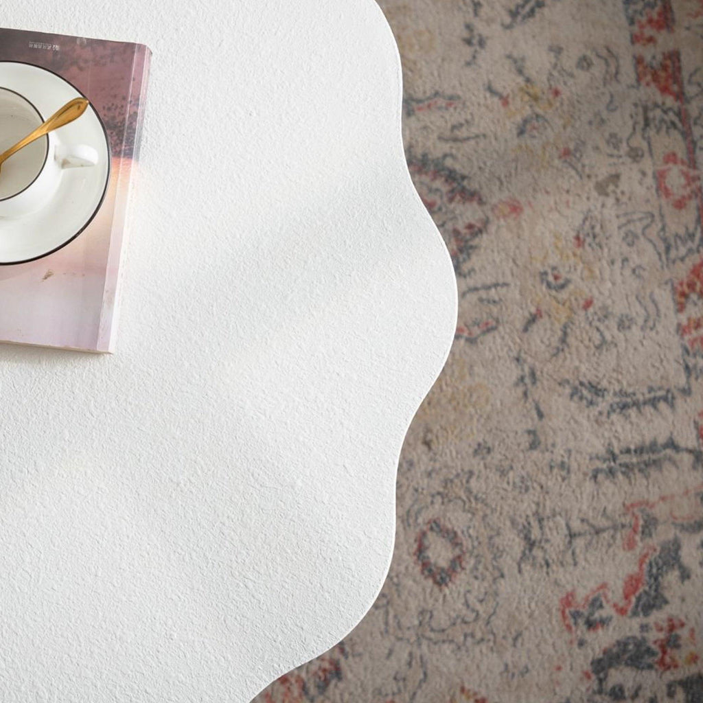 Scalloped White Coffee Table for Modern Living Spaces.