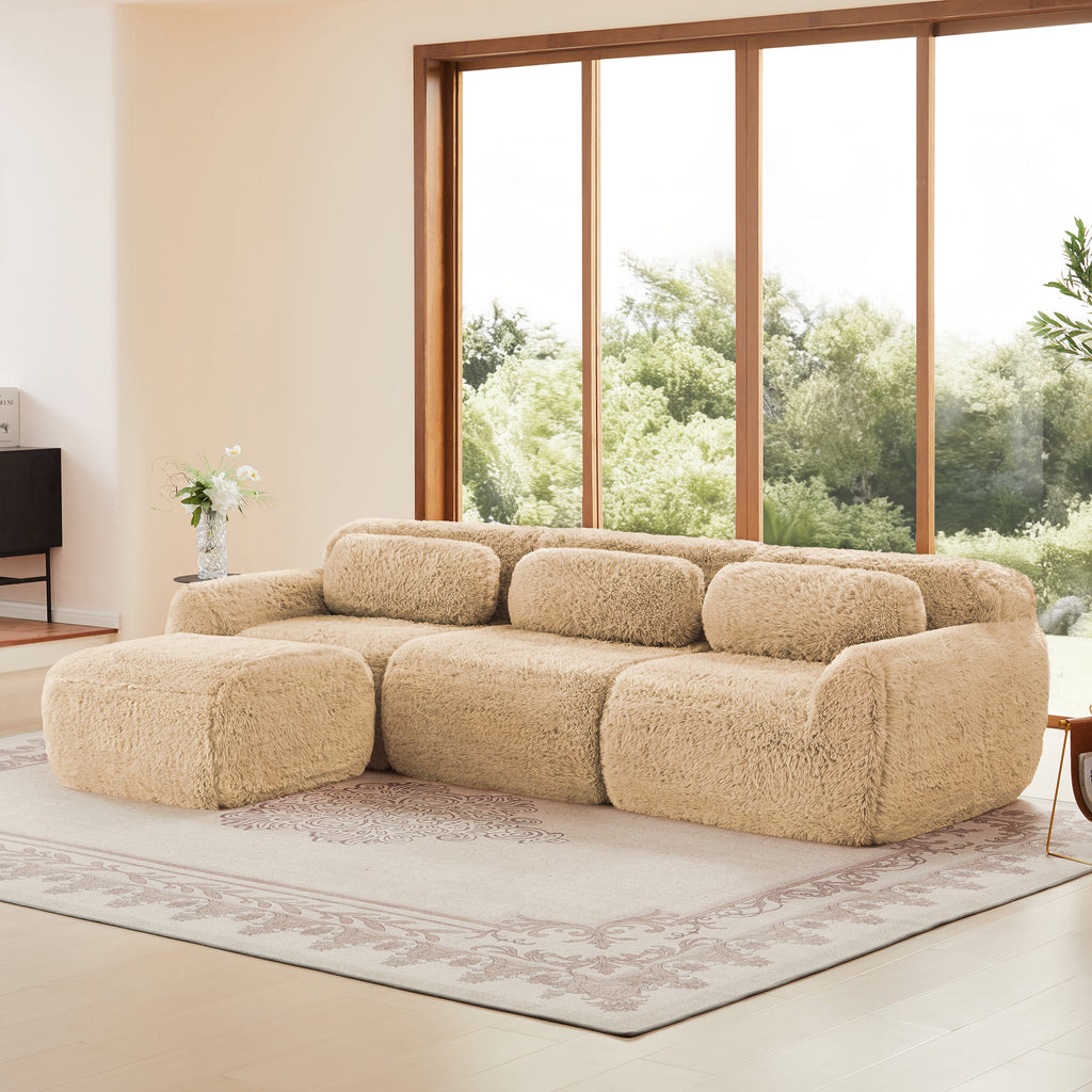 Modular sectional sofa in plush beige fabric with ottoman, showcasing flexible configuration and cozy seating.