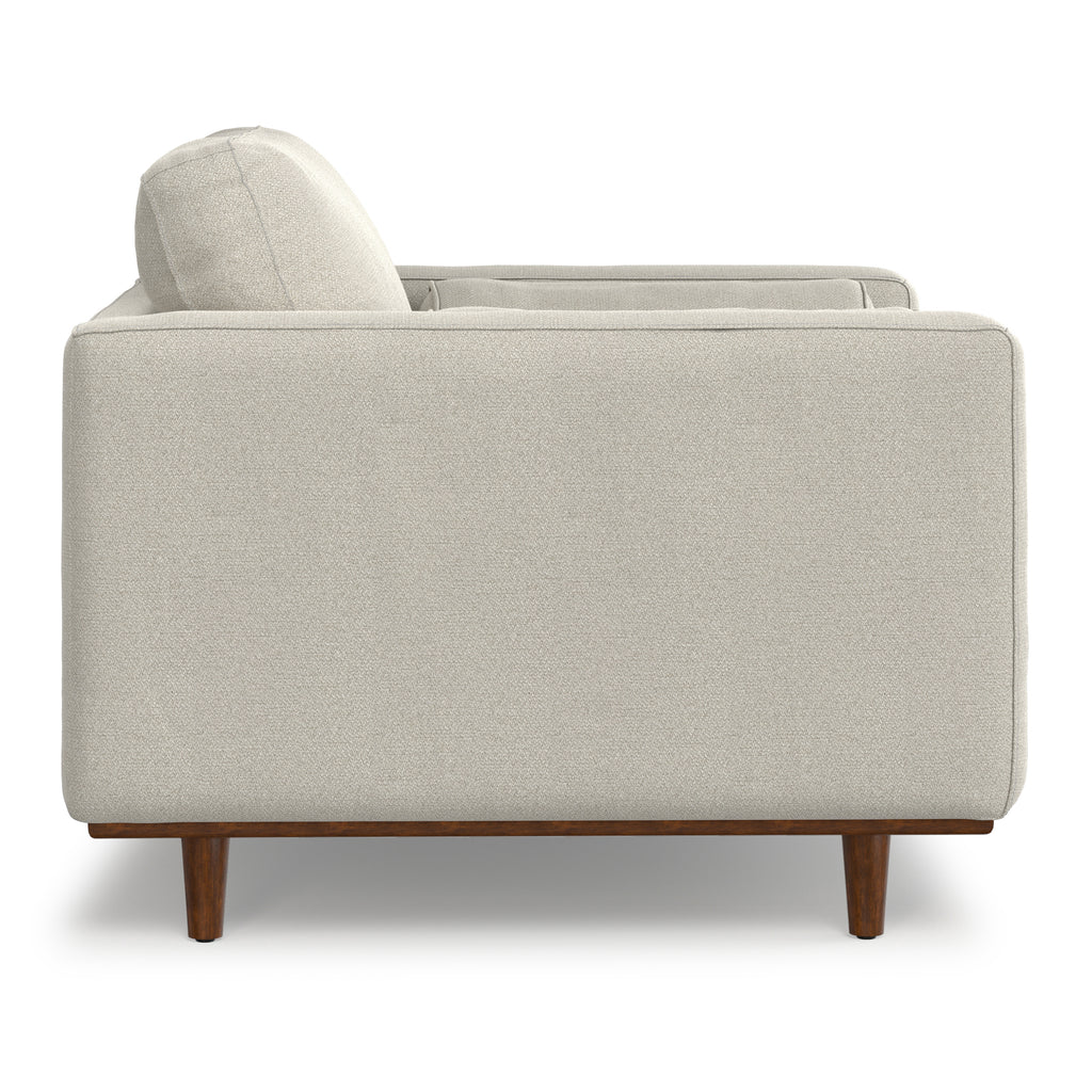 Side profile of Modern Armchair Cream White - Morrison Collection with boxy armrest and mid-century wood base.