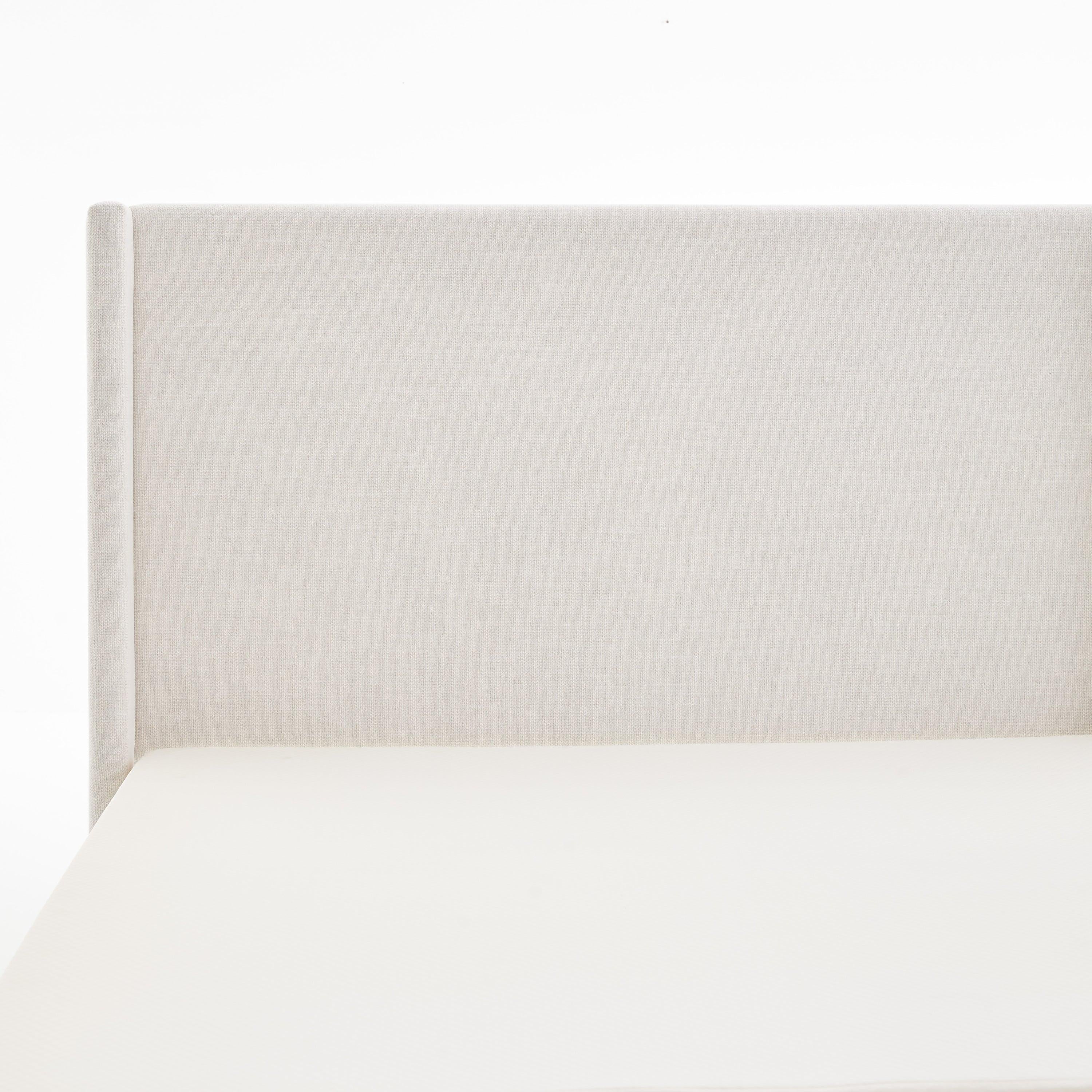 Minimalist Upholstered Wingback Bed with Wood Base Platform.