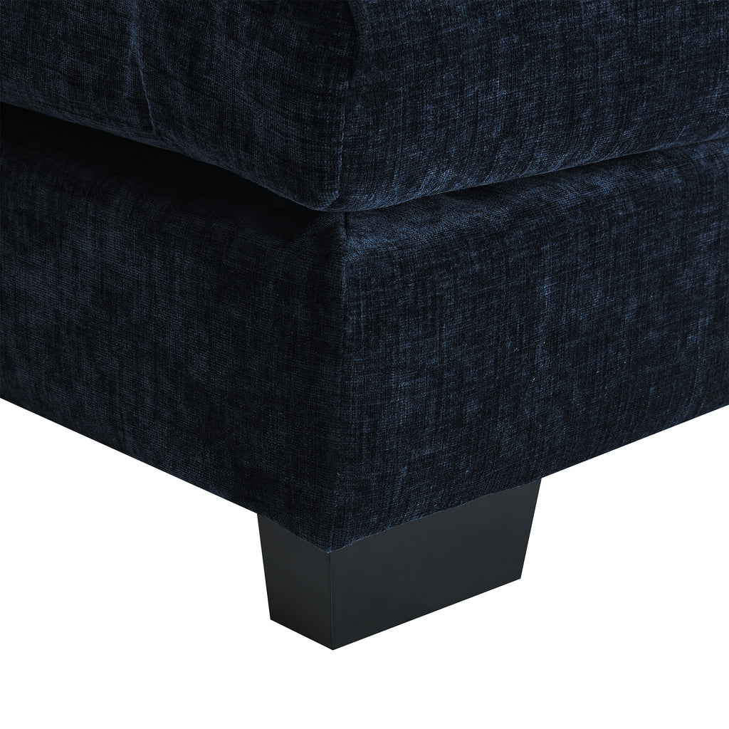Close-up of corner and leg of U-shaped sectional sofa with USB charger, highlighting sturdy wood frame and textured chenille fabric.